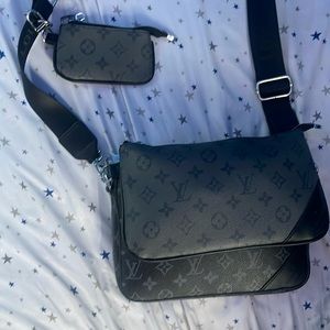 black Louis Vuitton bag trio messenger